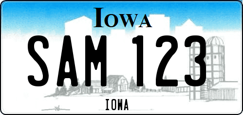 Matrícula de coche de de Iowa del sistema anterior con el nombre del condado y una ciudad